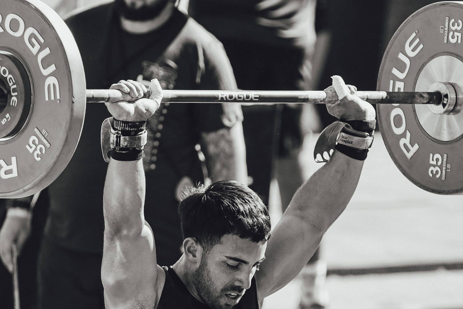Invictus Athlete, Lalo Torres, drops a successful lift in competition from overhead.