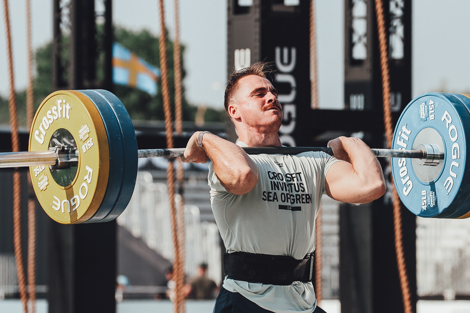 Sean Early cleaning a heavy barbell at the 2023 CrossFit Games 